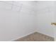 Walk-in closet with ample storage space on upper shelving at 541 Shadow Valley Ct, Lithonia, GA 30058