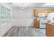 Bright dining area featuring hardwood floors and natural light at 541 Shadow Valley Ct, Lithonia, GA 30058
