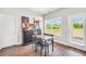 Dining area with natural light, modern furniture and neutral decor at 715 Colvin Dr, Locust Grove, GA 30248