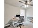Bright office space with a work desk, chair, and carpet flooring at 715 Colvin Dr, Locust Grove, GA 30248