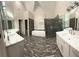 Luxury primary bath includes a soaking tub, dual vanities, and separate shower at 255 Carriage Station Dr, Lawrenceville, GA 30046