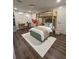 Stylish bedroom with bunk beds, wooden desk, modern decor, and a comfortable seating area at 255 Carriage Station Dr, Lawrenceville, GA 30046