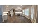 Open concept kitchen features a marble island, modern appliances, and custom cabinets at 255 Carriage Station Dr, Lawrenceville, GA 30046