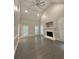 Spacious living room with fireplace, large windows, vaulted ceilings and hardwood floors at 255 Carriage Station Dr, Lawrenceville, GA 30046