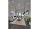Cozy living room featuring a vaulted ceiling, modern furnishings, and ample seating at 255 Carriage Station Dr, Lawrenceville, GA 30046
