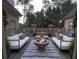 Outdoor living space with a stylish fire pit and comfortable seating, perfect for entertaining at 255 Carriage Station Dr, Lawrenceville, GA 30046