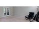 Bedroom with neutral walls, carpet, and French doors at 118 Brendylynn Trce, Woodstock, GA 30188