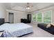 Bright main bedroom with trey ceiling features neutral tones, plush carpeting, and large windows offering natural light at 118 Brendylynn Trce, Woodstock, GA 30188