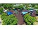 Aerial view of a colorful community playground with various play structures and shade covers at 118 Brendylynn Trce, Woodstock, GA 30188