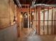 Unfinished basement with exposed beams, insulation, and visible wiring, ready to be customized at 208 Regency Ct, Acworth, GA 30102