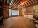 Unfinished basement space, with exposed beams, ready for customization at 208 Regency Ct, Acworth, GA 30102