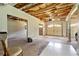 Basement featuring exposed ceiling and support columns and garage door at 208 Regency Ct, Acworth, GA 30102