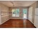 Dining area features hardwood floors, natural light, and access to an outdoor deck at 208 Regency Ct, Acworth, GA 30102