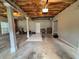Unfinished garage featuring concrete flooring, exposed ceiling, and open space for parking at 208 Regency Ct, Acworth, GA 30102