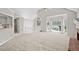 Spacious living room featuring fireplace and large windows at 208 Regency Ct, Acworth, GA 30102