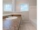 Bathroom featuring a tub and shower combo, vanity, and a neutral color scheme at 5888 Old Wellborn Trce, Lithonia, GA 30058