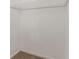 A small closet with carpet and a metal wire shelf, ready for organization at 5888 Old Wellborn Trce, Lithonia, GA 30058