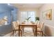 Dining room with seating for six, with bright natural lighting at 5888 Old Wellborn Trce, Lithonia, GA 30058
