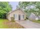 Well-maintained one-story home with neutral siding, traditional windows, and a convenient driveway at 5888 Old Wellborn Trce, Lithonia, GA 30058