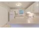 All white kitchen featuring lots of cabinets, and all-white appliances at 5888 Old Wellborn Trce, Lithonia, GA 30058
