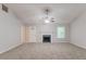 Neutral living room featuring a fireplace and abundant natural light at 5888 Old Wellborn Trce, Lithonia, GA 30058