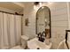 Bright bathroom featuring shiplap walls, a modern vanity, and black hardware at 617 Rock Springs Rd, Lawrenceville, GA 30043