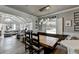 Open-concept dining area with modern lighting and comfortable seating at 617 Rock Springs Rd, Lawrenceville, GA 30043