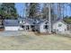 Charming single-Gathering home featuring a three-car garage and a cozy front porch at 617 Rock Springs Rd, Lawrenceville, GA 30043