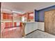 Retro kitchen featuring tile floor, bar, and ample cabinet space at 617 Rock Springs Rd, Lawrenceville, GA 30043