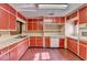 Kitchen featuring tile floors and white appliances at 617 Rock Springs Rd, Lawrenceville, GA 30043