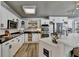 Well-lit kitchen with modern appliances and dark countertops at 617 Rock Springs Rd, Lawrenceville, GA 30043