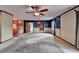 Living room featuring carpet and an open pass through to the kitchen at 617 Rock Springs Rd, Lawrenceville, GA 30043