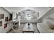 Charming attic living room with a makeup vanity, window seating, and sloped ceilings at 617 Rock Springs Rd, Lawrenceville, GA 30043
