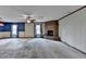 Spacious living room featuring a brick fireplace and large window at 617 Rock Springs Rd, Lawrenceville, GA 30043