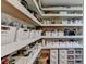 Well-organized pantry with white shelving, drawers, and plenty of storage for food and kitchen essentials at 617 Rock Springs Rd, Lawrenceville, GA 30043