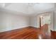 Bedroom with hardwood floors, tray ceilings, and arched doorways at 760 River Gate Dr, Atlanta, GA 30350