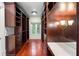 Spacious walk-in closet with custom shelving and drawers at 760 River Gate Dr, Atlanta, GA 30350
