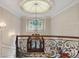 Foyer showcasing a decorative wrought iron staircase and ornate domed ceiling at 760 River Gate Dr, Atlanta, GA 30350