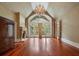 Light-filled living room boasting a fireplace, large windows and French doors at 760 River Gate Dr, Atlanta, GA 30350