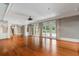 Spacious living room with hardwood floors, white trim, and french doors for natural light at 760 River Gate Dr, Atlanta, GA 30350