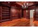 Spacious home office featuring custom built-in shelving and rich wood accents at 760 River Gate Dr, Atlanta, GA 30350