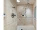 Walk-in shower with multiple shower heads and tiled walls at 760 River Gate Dr, Atlanta, GA 30350