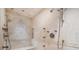 Shower featuring a built-in bench and decorative mosaic tile insert at 760 River Gate Dr, Atlanta, GA 30350