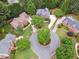 Aerial view of cul-de-sac home with mature landscaping and circular driveway at 151 Overhill Point, Alpharetta, GA 30005