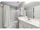 All-white bathroom with tub/shower, vanity, and good storage at 151 Overhill Point, Alpharetta, GA 30005