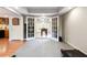 Large bonus room featuring an entryway to a recreational area and an entryway to the kitchen at 151 Overhill Point, Alpharetta, GA 30005