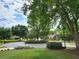 Scenic cul-de-sac with lush green landscaping, mature trees, and attractive homes at 151 Overhill Point, Alpharetta, GA 30005