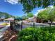 Community pool area with resort-style amenities and beautiful landscaping at 151 Overhill Point, Alpharetta, GA 30005