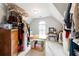 Spacious walk-in closet with sloped ceiling and hanging racks for optimal storage at 151 Overhill Point, Alpharetta, GA 30005