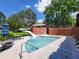 Resort-style pool with water slide feature and ample lounge seating at 151 Overhill Point, Alpharetta, GA 30005
